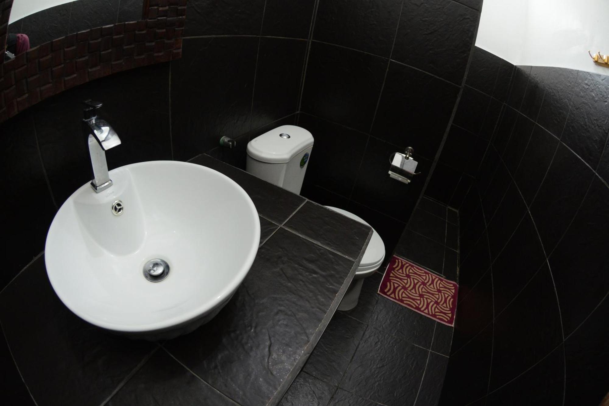 Relaxing Homestay Kuta  Phòng bức ảnh